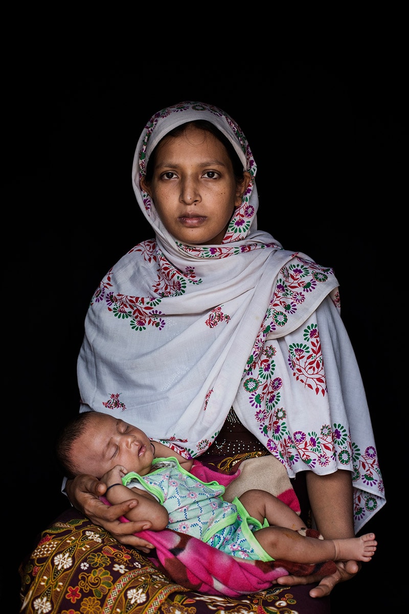 Shamina Yasmin, 25, and her daughter Sharmin Yasmin, one month. Rohingya Taung Bazar survivor.